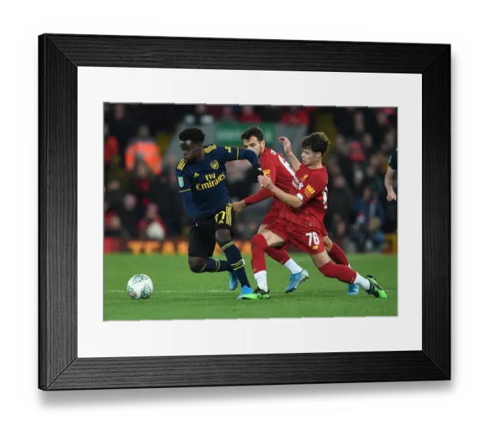 Framed Print : Saka vs Williams: Intense Battle in Liverpool v Arsenal Carabao Cup Clash Framed Print : Saka vs Williams: Intense Battle in Liverpool v Arsenal Carabao Cup Clash