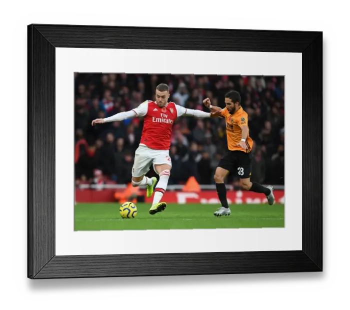 Framed Print : Arsenal's Calum Chambers Outmaneuvers Joao Moutinho in Premier League Clash vs. Wolverhampton Wanderers Framed Print : Arsenal's Calum Chambers Outmaneuvers Joao Moutinho in Premier League Clash vs. Wolverhampton Wanderers