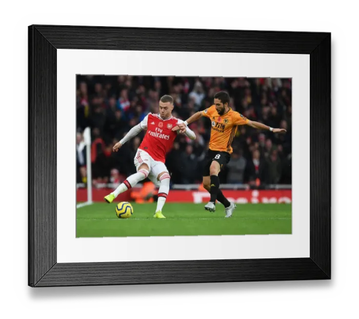 Framed Print : Arsenal's Calum Chambers Outmaneuvers Wolves Joao Moutinho in Premier League Clash Framed Print : Arsenal's Calum Chambers Outmaneuvers Wolves Joao Moutinho in Premier League Clash