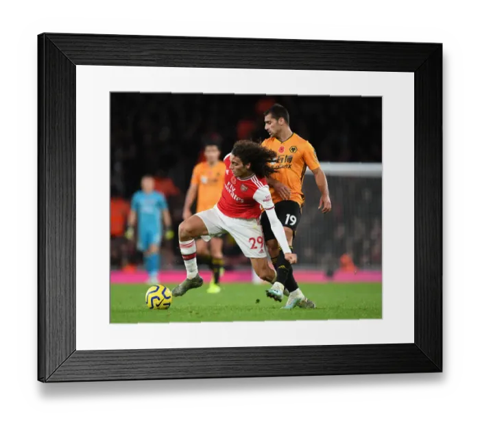 Framed Print : Guendouzi's Slick Moves: Arsenal's Midfield Mastery over Wolves Framed Print : Guendouzi's Slick Moves: Arsenal's Midfield Mastery over Wolves