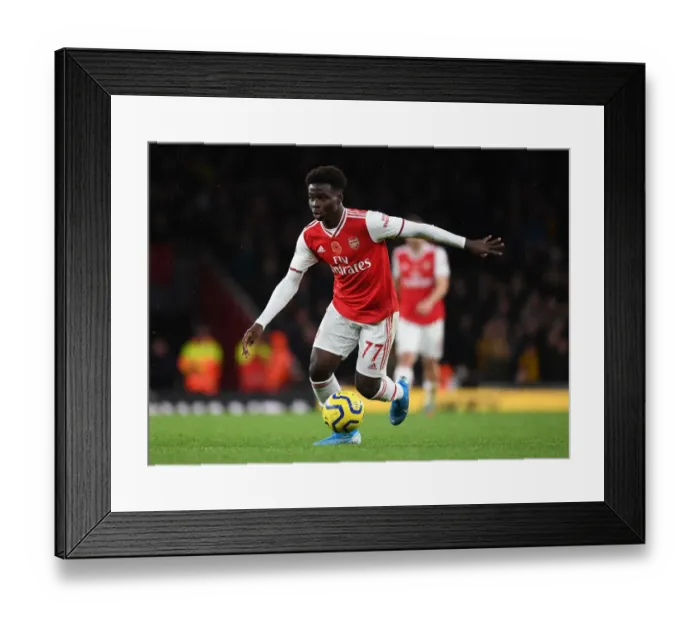 Framed Print : Arsenal's Bukayo Saka in Action: Arsenal vs. Wolverhampton Wanderers (2019-2020) Framed Print : Arsenal's Bukayo Saka in Action: Arsenal vs. Wolverhampton Wanderers (2019-2020)