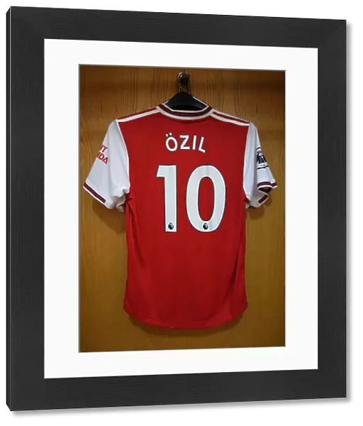 Mesut Ozil's Absence: An Empty Arsenal Jersey in the Home Changing Room vs. Wolverhampton Wanderers (2019-20)