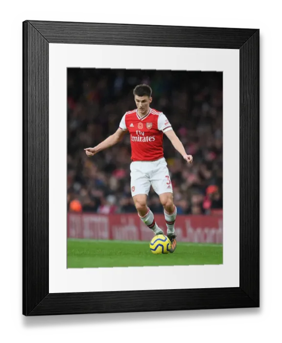 Framed Print : Arsenal's Kieran Tierney in Action during Premier League Clash against Wolverhampton Wanderers