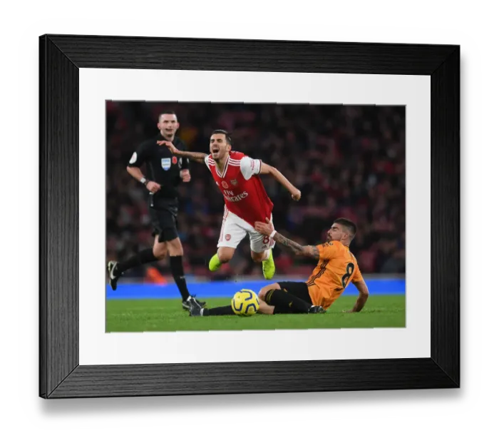 Framed Print : Dani Ceballos vs. Ruben Neves: A Premier League Showdown at Emirates Stadium
