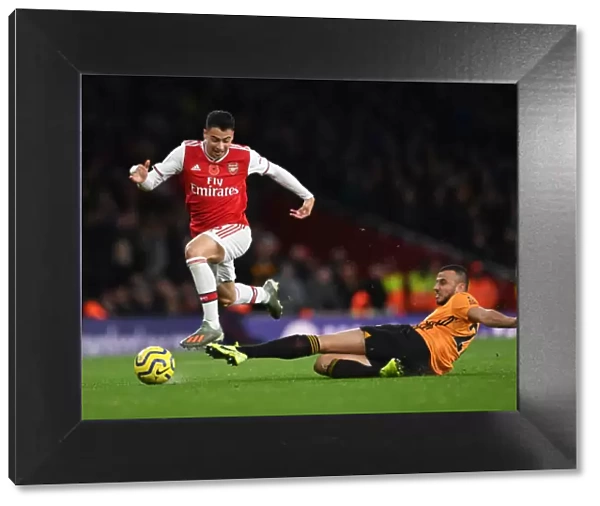 Martinelli Foul: Arsenal's Star Forward Halted by Saiss in Arsenal vs. Wolverhampton Clash (2019-20)