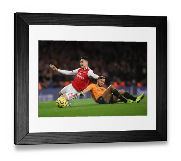 Framed Print : Martinelli Foul: Arsenal's Rising Star Halted by Saiss in Arsenal vs. Wolverhampton (2019-20) Framed Print : Martinelli Foul: Arsenal's Rising Star Halted by Saiss in Arsenal vs. Wolverhampton (2019-20)