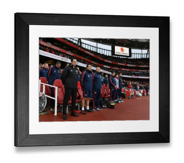 Framed Print : Unai Emery Honors the Fallen: A Moment of Silence at Arsenal's Emirates Stadium (2019-20)