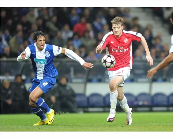Nicklas Bendtner (Arsenal) Bruno Alves (Porto). FC Porto 2: 1 Arsenal, UEFA Champions League