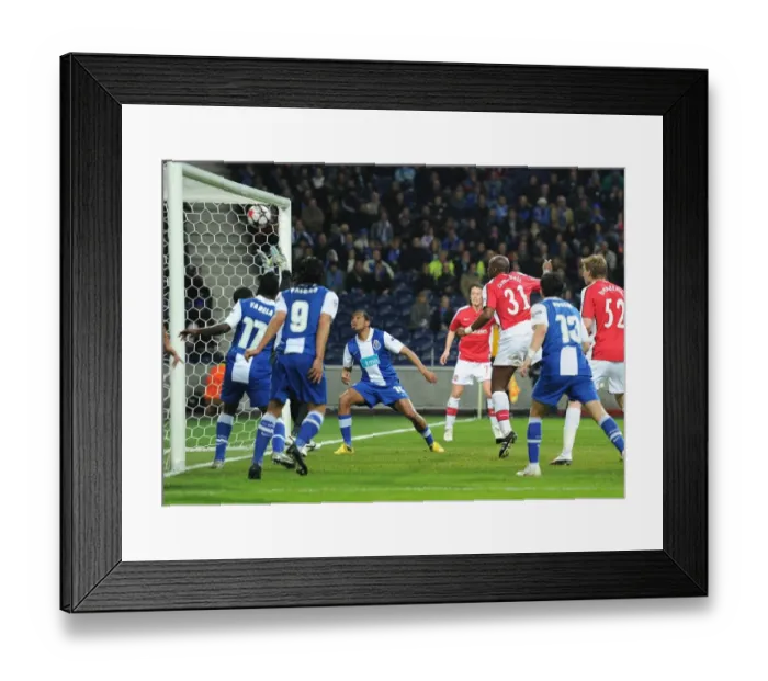 Framed Print : Sol Campbell heads past Porto goalkeeper Helton to score the Arsenal goal Framed Print : Sol Campbell heads past Porto goalkeeper Helton to score the Arsenal goal