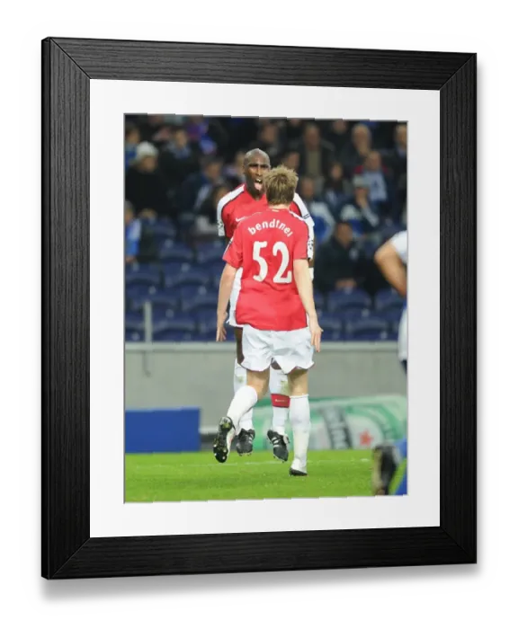 Framed Print : Sol Campbell and Nicklas Bendtner: Arsenal's Unforgettable Goal Celebration Against FC Porto in the Champions League Framed Print : Sol Campbell and Nicklas Bendtner: Arsenal's Unforgettable Goal Celebration Against FC Porto in the Champions League