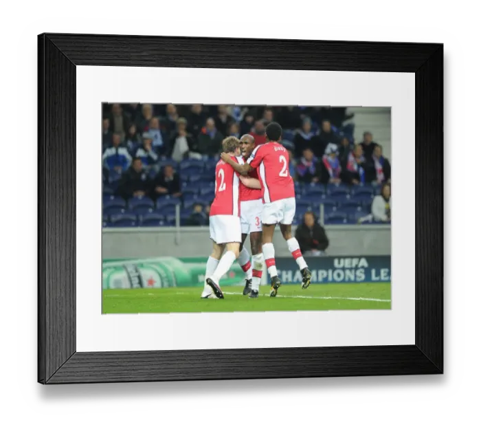 Framed Print : Sol Campbell's Goal Celebration with Bendtner and Diaby: Arsenal's Victory Moment against FC Porto in the UEFA Champions League Framed Print : Sol Campbell's Goal Celebration with Bendtner and Diaby: Arsenal's Victory Moment against FC Porto in the UEFA Champions League