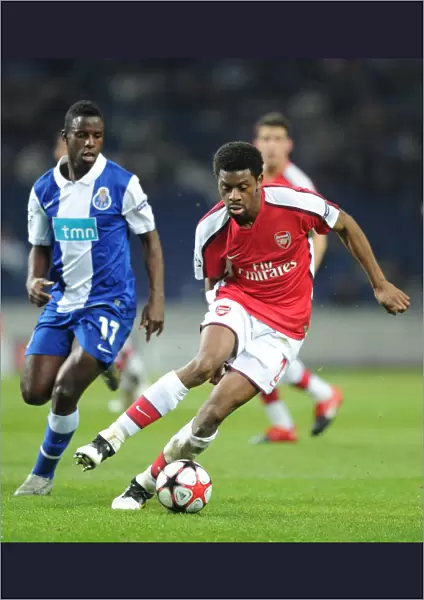Abou Diaby (Arsenal) Silvestre Varela (Porto). FC Porto 2: 1 Arsenal, UEFA Champions League