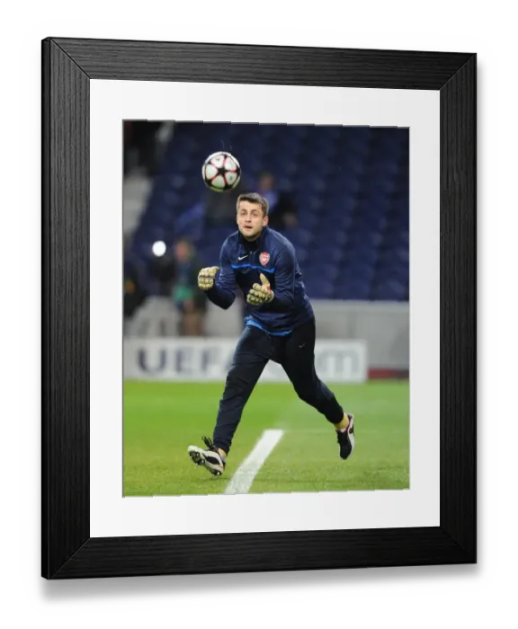 Framed Print : Fabianski's Brave Performance: Arsenal vs. FC Porto, UEFA Champions League 2010 (1st Leg)