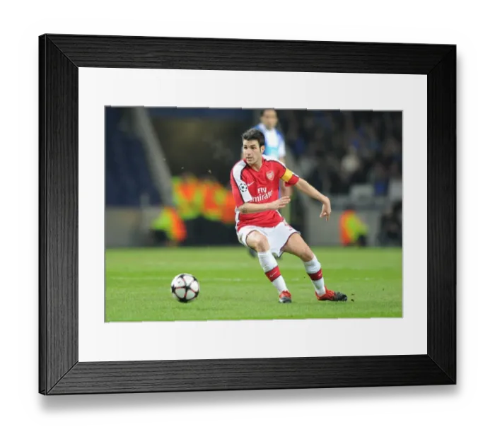Framed Print : FC Porto Leads Arsenal in UEFA Champions League: Cesc Fabregas Faces Off in Intense 1st Leg (2:1)