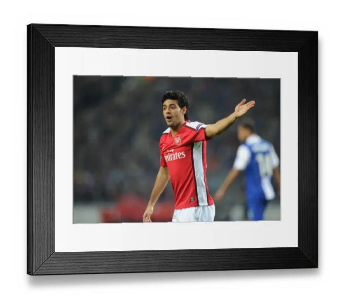Framed Print : Carlos Vela Leads Arsenal in First Leg of UEFA Champions League Clash Against FC Porto
