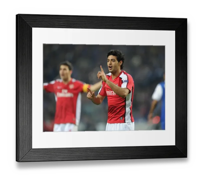Framed Print : Carlos Vela Sparks Arsenal's UEFA Champions League Battle against FC Porto: 1st Leg