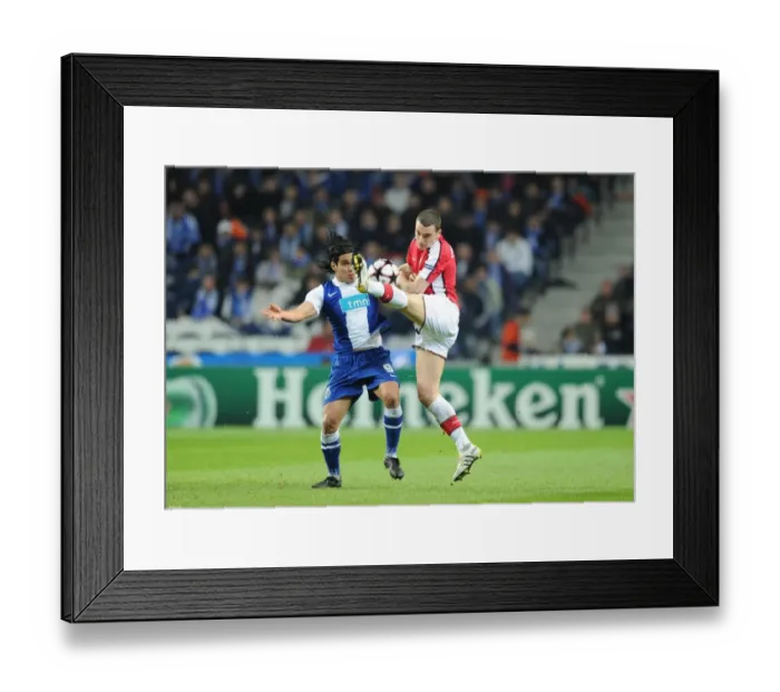 Framed Print : Thomas Vermaelen vs. Falcao: FC Porto Outscores Arsenal in UEFA Champions League First Leg Framed Print : Thomas Vermaelen vs. Falcao: FC Porto Outscores Arsenal in UEFA Champions League First Leg