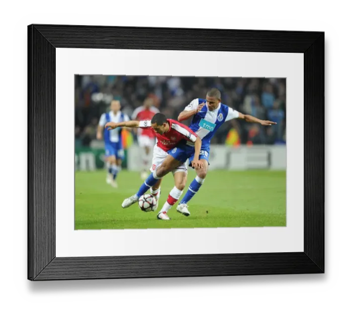 Framed Print : Theo Walcott vs. Fernando: A Champions League Battle at Estadio Do Dragao (2010) Framed Print : Theo Walcott vs. Fernando: A Champions League Battle at Estadio Do Dragao (2010)