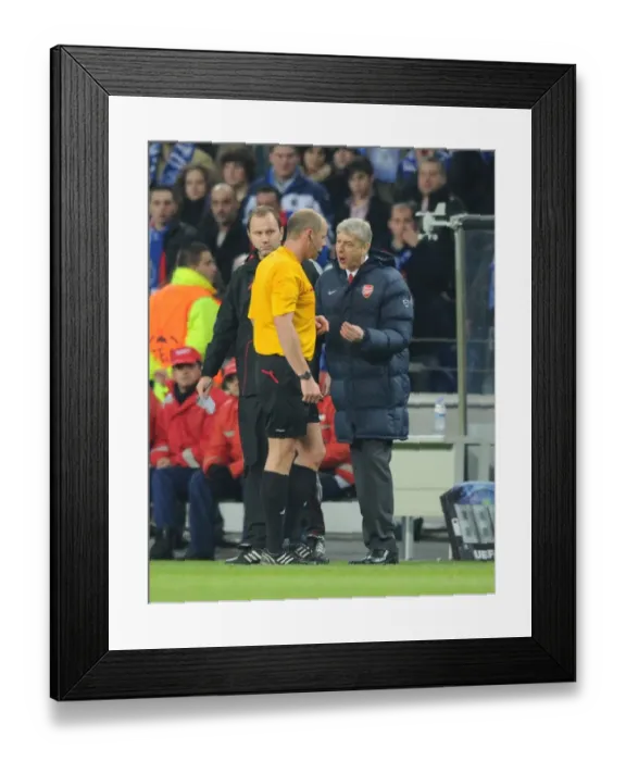 Framed Print : Arsene Wenger Protests to Referee Martin Hansson after Porto's Second Goal in UEFA Champions League Clash Framed Print : Arsene Wenger Protests to Referee Martin Hansson after Porto's Second Goal in UEFA Champions League Clash