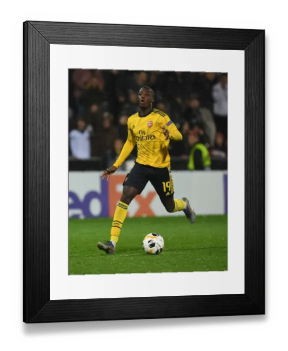 Framed Print : Arsenal's Nicolas Pepe Dazzles in Europa League Showdown against Vitoria Guimaraes