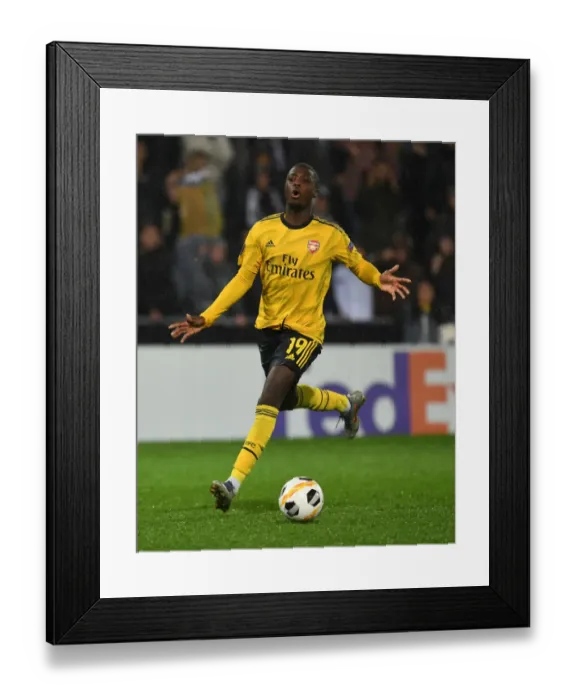 Framed Print : Nicolas Pepe's Star Performance: Arsenal Triumph Over Vitoria Guimaraes in Europa League