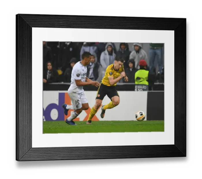 Framed Print : Arsenal's Kieran Tierney Goes Head-to-Head with Vitoria Guimaraes Victor Garcia in Europa League Showdown Framed Print : Arsenal's Kieran Tierney Goes Head-to-Head with Vitoria Guimaraes Victor Garcia in Europa League Showdown