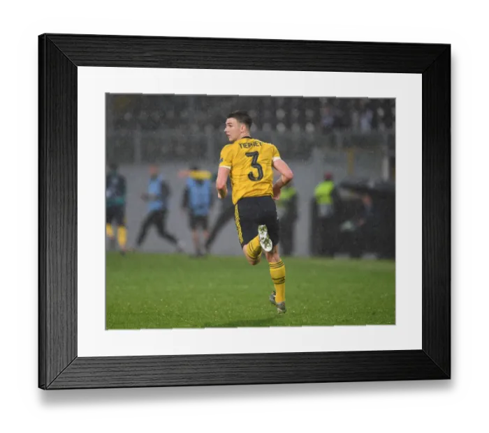 Framed Print : Arsenal's Kieran Tierney in Action during UEFA Europa League Match vs Vitoria Guimaraes