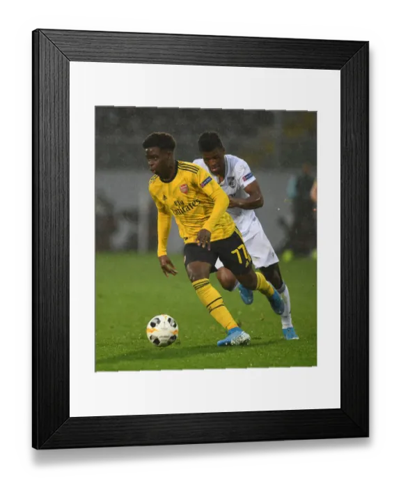 Framed Print : Arsenal's Europa League Victory: Bukayo Saka's Electrifying Run Against Vitoria Guimaraes Framed Print : Arsenal's Europa League Victory: Bukayo Saka's Electrifying Run Against Vitoria Guimaraes