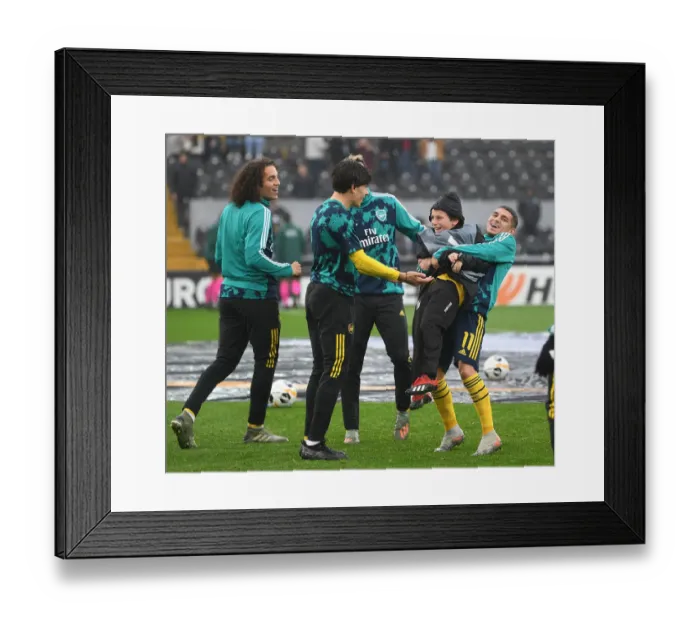 Framed Print : Arsenal Players Share Pre-Match Fun with Ballboy Ahead of Vitoria Guimaraes Clash, UEFA Europa League 2019-20