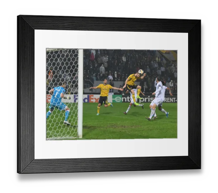 Framed Print : Mustafi Scores: Arsenal Tops Vitoria Guimaraes in Europa League