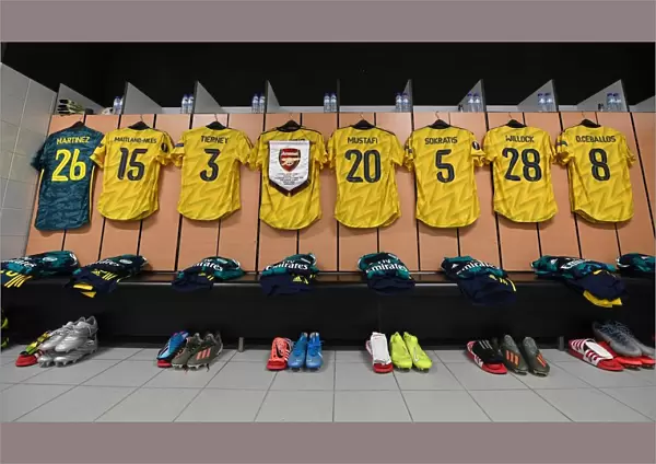 Arsenal FC: United in the Huddle - Preparing for Battle against Vitoria Guimaraes in the Europa League