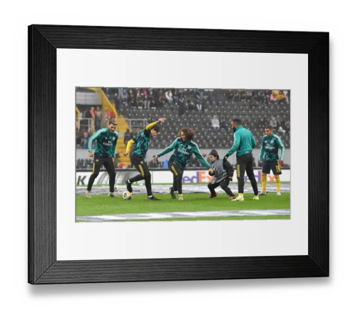 Framed Print : Arsenal Players Warm Up Ahead of Vitoria Guimaraes Clash in Europa League Framed Print : Arsenal Players Warm Up Ahead of Vitoria Guimaraes Clash in Europa League