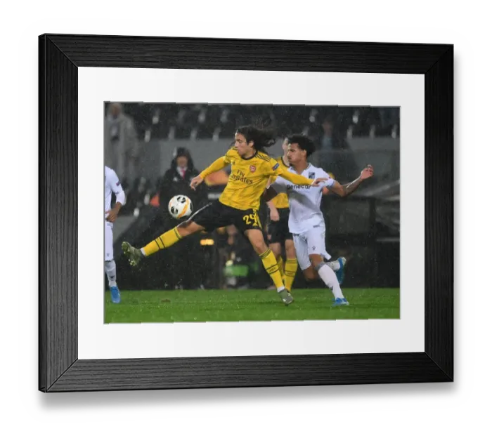 Framed Print : Arsenal's Guendouzi Faces Off Against Vitoria Guimaraes: UEFA Europa League Clash Framed Print : Arsenal's Guendouzi Faces Off Against Vitoria Guimaraes: UEFA Europa League Clash