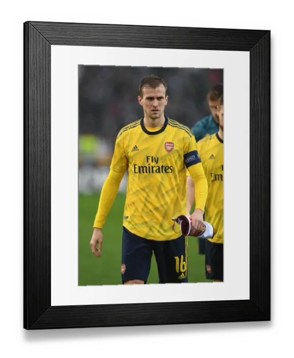 Framed Print : Arsenal's Rob Holding Prepares for Vitoria Guimaraes Clash in Europa League Group Stage
