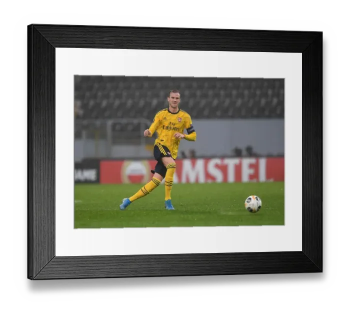 Framed Print : Rob Holding in Action: Arsenal's Europa League Clash vs Vitoria Guimaraes