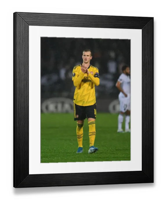 Framed Print : Arsenal's Rob Holding Celebrates Europa League Victory with Fans