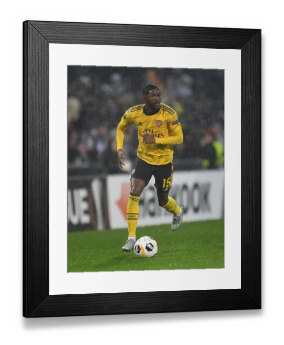 Framed Print : Ainsley Maitland-Niles in Action: Arsenal vs. Vitoria Guimaraes, UEFA Europa League (2019) Framed Print : Ainsley Maitland-Niles in Action: Arsenal vs. Vitoria Guimaraes, UEFA Europa League (2019)