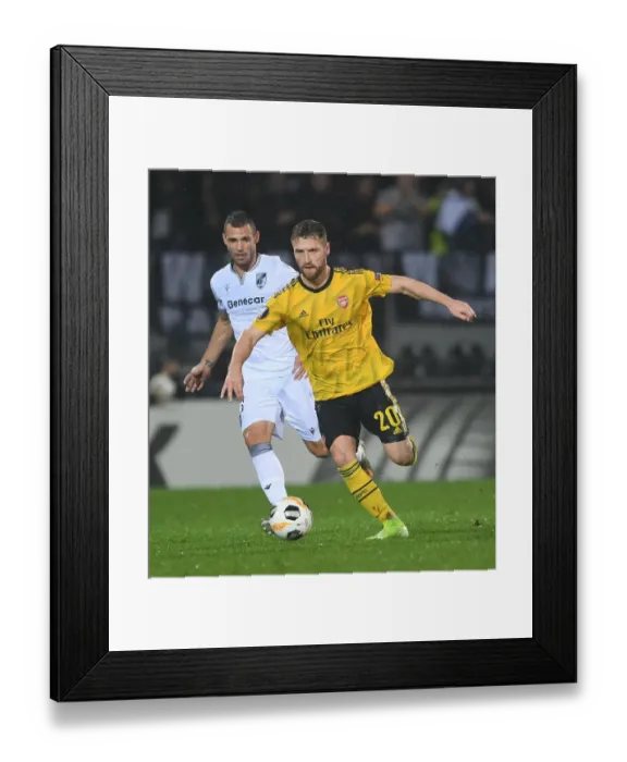 Framed Print : Mustafi in Action: Arsenal vs. Vitoria Guimaraes, UEFA Europa League (2019-20)