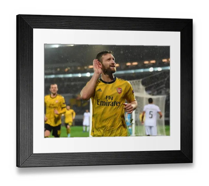 Framed Print : Mustafi Scores: Arsenal Triumphs Over Vitoria Guimaraes in Europa League
