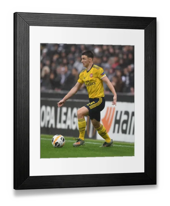 Framed Print : Arsenal's Kieran Tierney in Action against Vitoria Guimaraes in UEFA Europa League Framed Print : Arsenal's Kieran Tierney in Action against Vitoria Guimaraes in UEFA Europa League