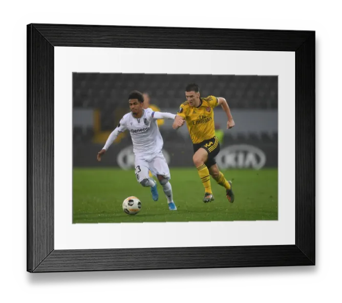 Framed Print : Arsenal's Kieran Tierney vs Marcus Edwards: Intense Europa League Showdown