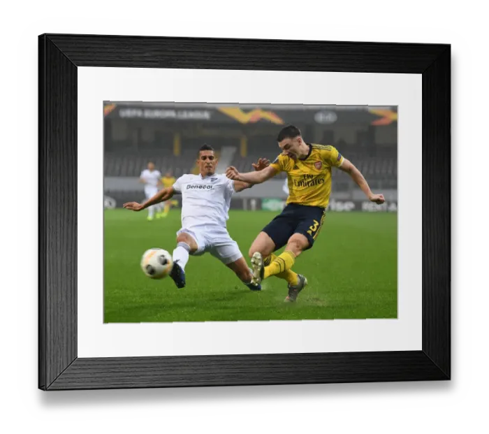 Framed Print : Arsenal's Kieran Tierney Clashes with Vitoria Guimaraes in Europa League Showdown Framed Print : Arsenal's Kieran Tierney Clashes with Vitoria Guimaraes in Europa League Showdown