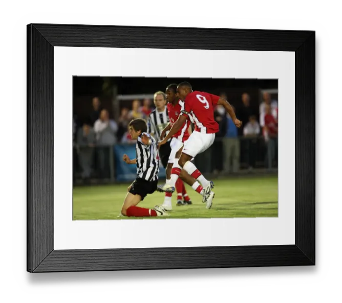 Framed Print : Jay Simpson scores Arsenals 3rd goal under pressure from Jack Bradshaw (Maidenhead)