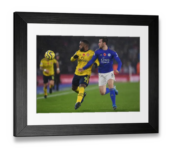 Framed Print : Lacazette vs. Chilwell: A Premier League Battle - Leicester City vs. Arsenal