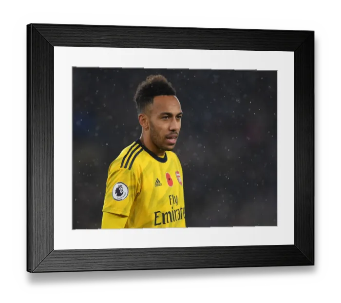 Framed Print : Arsenal's Aubameyang Goes Head-to-Head with Leicester City in Premier League Showdown