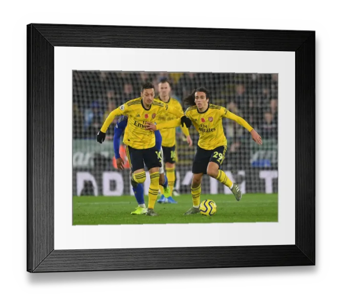 Framed Print : Arsenal's Ozil and Guendouzi in Action against Leicester City (Premier League 2019-20)