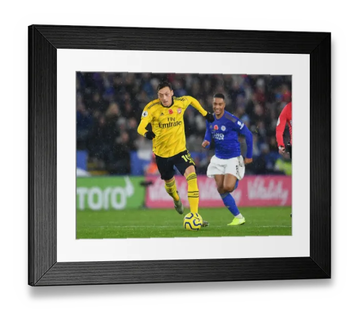 Framed Print : Mesut Ozil in Action: Premier League Showdown - Leicester City vs. Arsenal (2019-20) Framed Print : Mesut Ozil in Action: Premier League Showdown - Leicester City vs. Arsenal (2019-20)