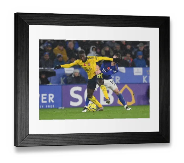 Framed Print : Pepe vs Maddison: Battle at The King Power Stadium - Leicester City vs Arsenal FC, Premier League 2019-20 Framed Print : Pepe vs Maddison: Battle at The King Power Stadium - Leicester City vs Arsenal FC, Premier League 2019-20