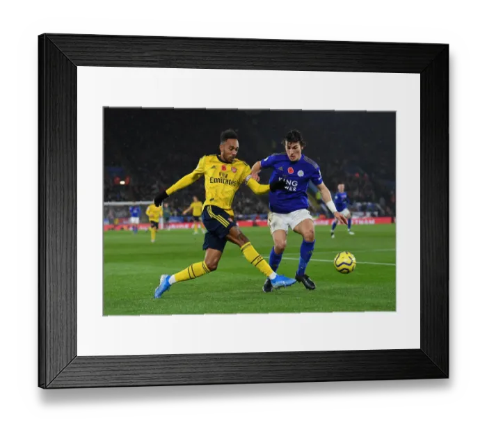 Framed Print : Aubameyang vs Soyuncu: Intense Battle at The King Power Stadium - Leicester City vs Arsenal FC, Premier League 2019-20