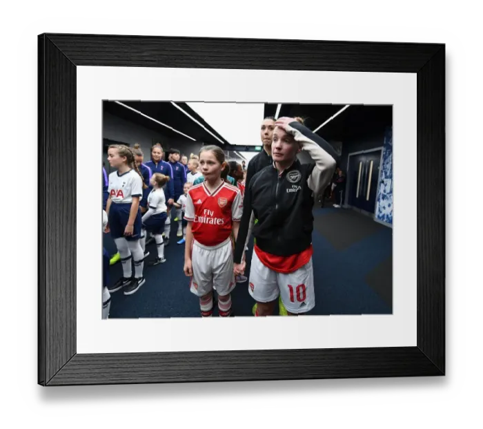 Framed Print : Arsenal's Kim Little and Mascot Before Tottenham Clash in FA Womens Super League Framed Print : Arsenal's Kim Little and Mascot Before Tottenham Clash in FA Womens Super League